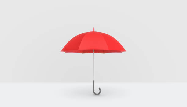 istock An open classic red umbrella with a handle vertically placed on white background 679495542