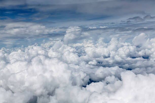 Aerial view of Tropical clouds and cloudscape while flying onboard a plane