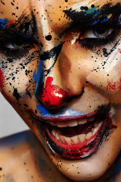 istock Smiling evil Clown Woman. Creative Make-Up 679504898