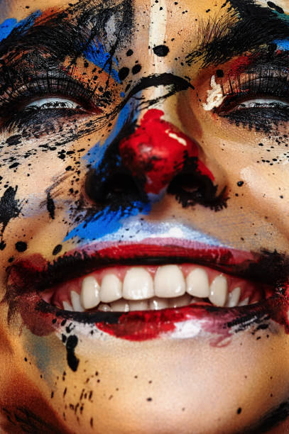 istock Smiling insane Clown Woman with white Eyes 679504994