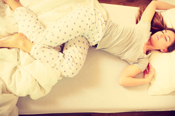 istock Sleepy woman sleeping in the bed. 679505870