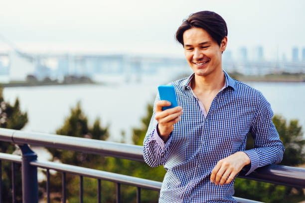 istock Tourist in Japan text messaging 679509008
