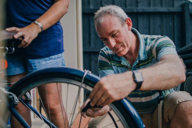 istock Inflating the Tire on a Bicycle 679511196