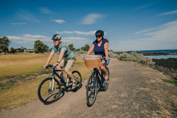 istock Couple Cycling in the Park 679511564