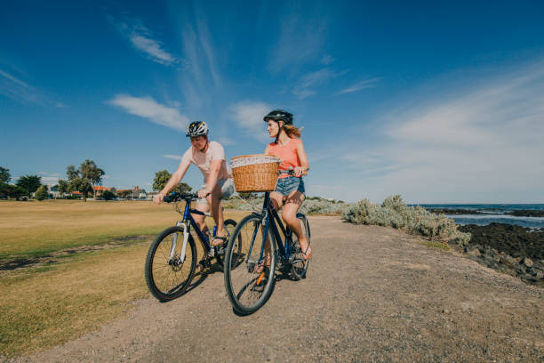 Young Couple Cycling in the Park