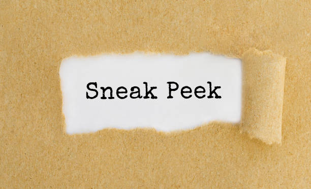istock Text Sneak Peek appearing behind ripped brown paper. 679521472