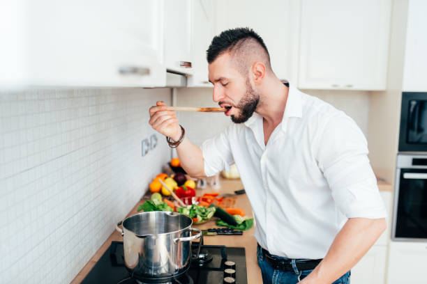 istock Details of modern lifestyle. Master chef tasting soup 679521966