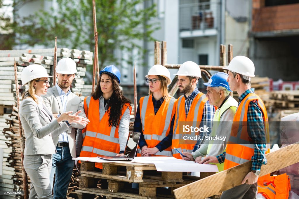Operai edili - Foto stock royalty-free di Cantiere di costruzione