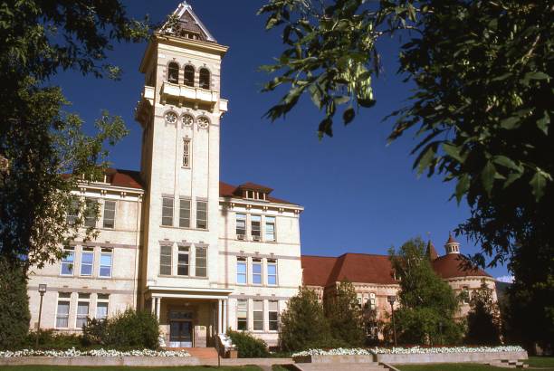 Old Main academic building on campus of Utah State University Logan Utah Old Main academic building on campus of Utah State University Logan Utah utah state university stock pictures, royalty-free photos & images