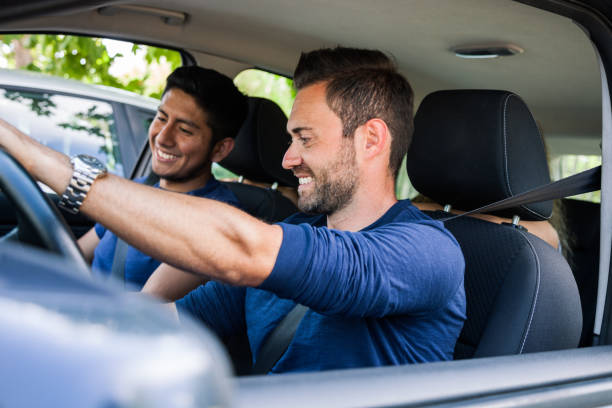 istock Friends sitting in the car ready to start vacations 679527902
