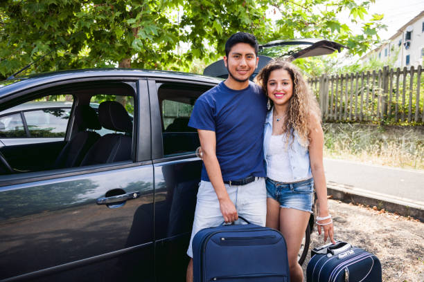 istock Friends loading the car to start a great vacation together 679527942