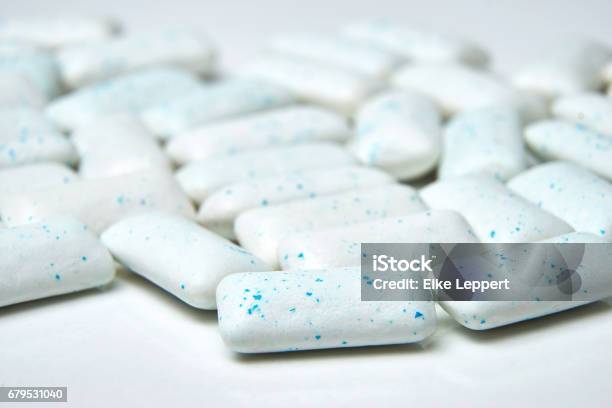 Chewing Gum Spilled Out On White Background With Low Depth Of Field Macro Shot Stock Photo - Download Image Now