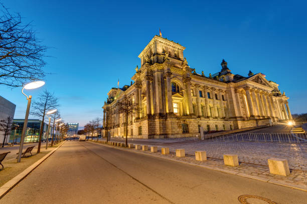 istock The german Reichstag in Berlin before sunrise 679535542