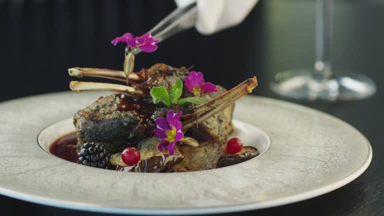 Chef Garnish Fried Beef Ribs in Luxury Restaurant