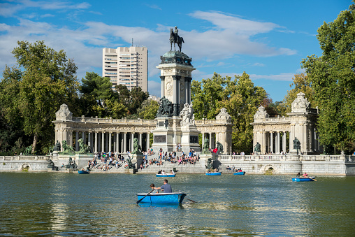 MADRID- SEPTEMBER 13, 2015: Monument to King Alfonso XII and pond, in Retiro Park, Madrid, Spain, on September 13, 2015.