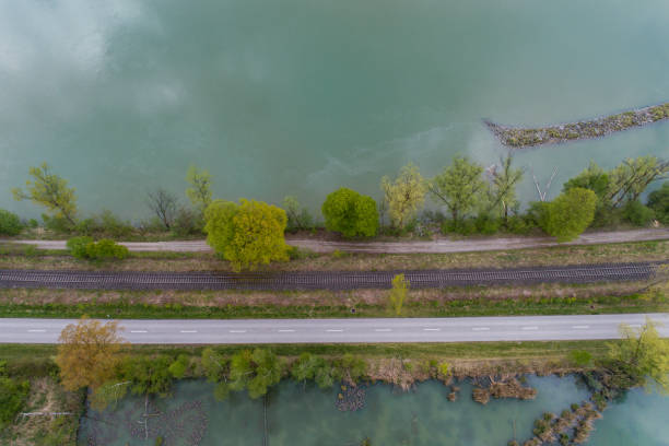istock Water, street and a railway 679549458