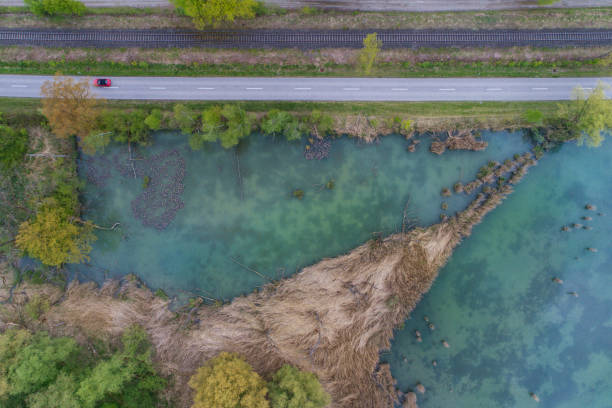 istock Water, street and a railway 679550982