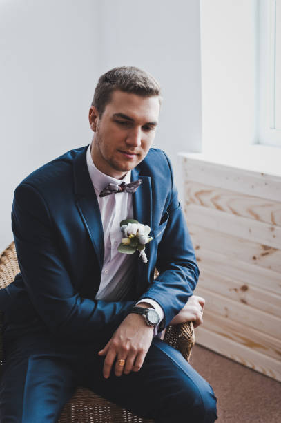 istock A man stands near a large window 6422. 679554012