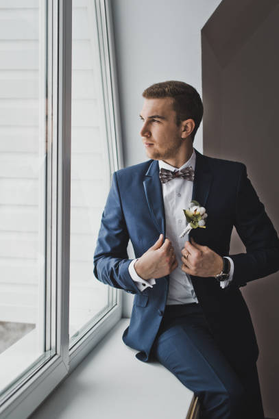istock A man stands near a large window 6419. 679554254
