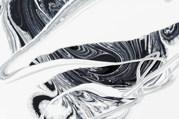 istock abstract background, white and black mineral oil paint on water 679554372