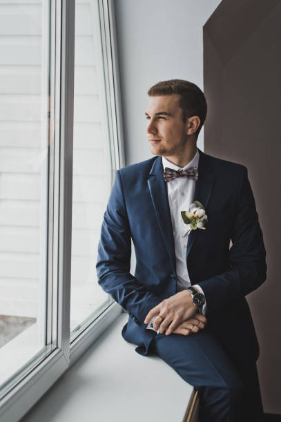 istock A man stands near a large window 6420. 679554970