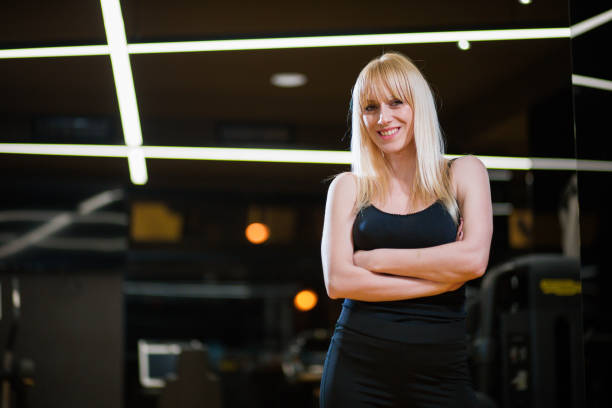 istock Beautiful women in gym 679555074