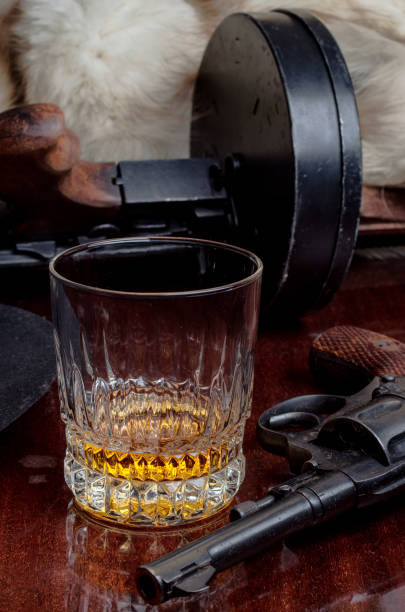 istock Guns, whiskey  and cigar 679559912