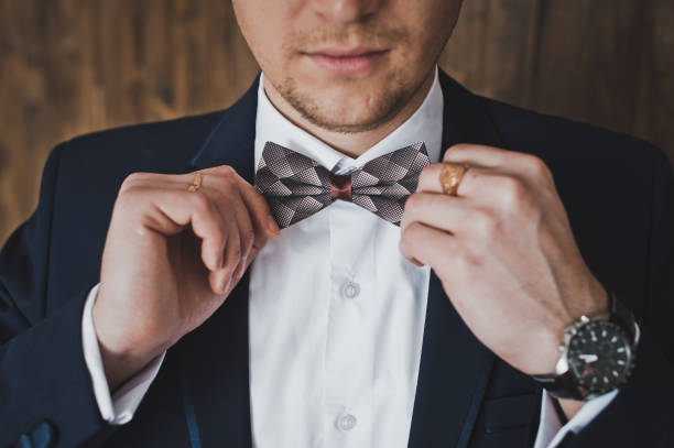 istock Male hands adjusting the tie 6407. 679561870