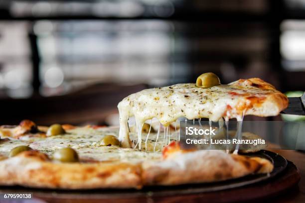 Pizza With Melting Mozzarella Stock Photo - Download Image Now - Pizza, Cheese, Italy