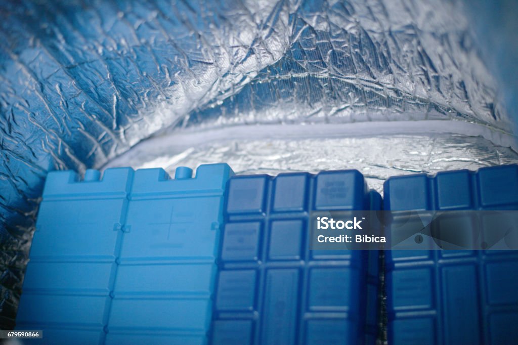 Blue ice packs View on the inside of a picnic bag full of blue ice packs Cooler - Container Stock Photo