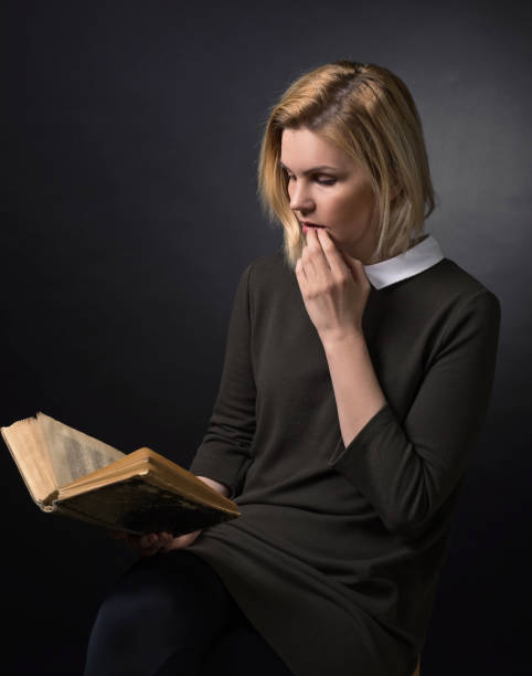 istock Young woman with book . 679591582