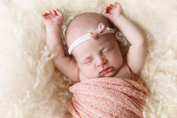 istock Newborn Baby Girl Sleeping 679593520