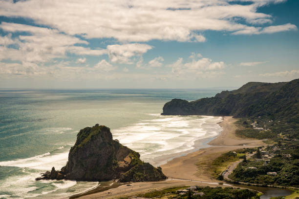 istock Aerial view on the lion rock on Piha beach. 679642930