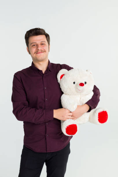 istock Excited man surprising with gifts 679653096