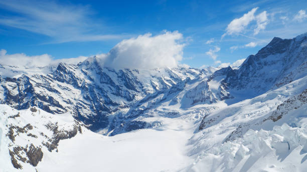 istock Snow mountain Jungfrau with blue sky background 679661984