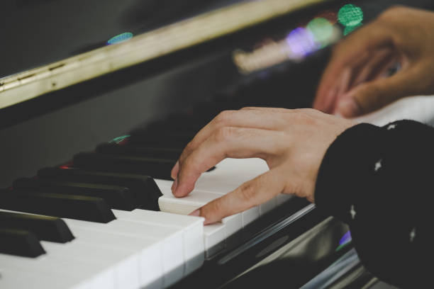 istock Playing Piano Close-up Shot 679681146