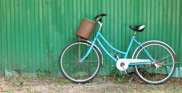 istock old bicycle at grunge metal wall 679694396