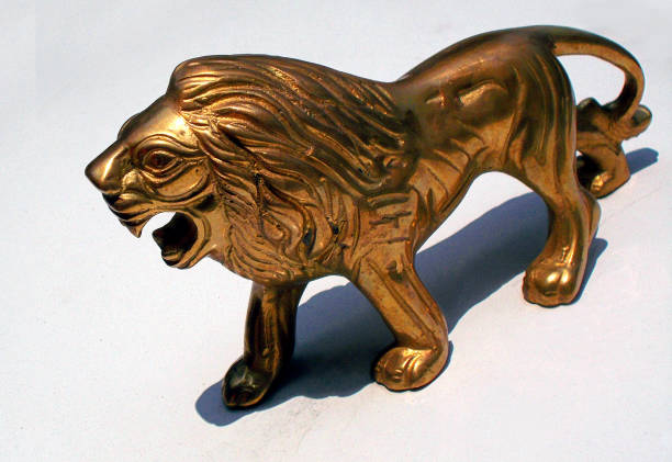 istock Brass metallic sculpture of Lion 679718218