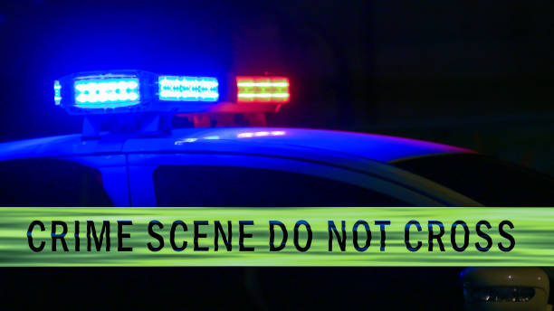 istock Police car siren with boundary tape 679720138