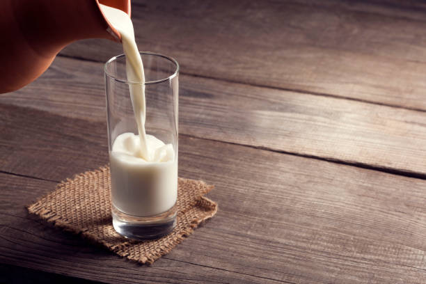 glass of milk stock photo