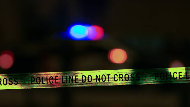 istock Police car siren with boundary tape, Defocused 679724462