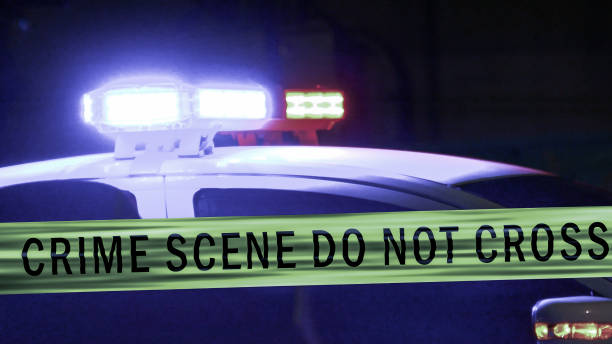 istock Police car siren with boundary tape 679724504