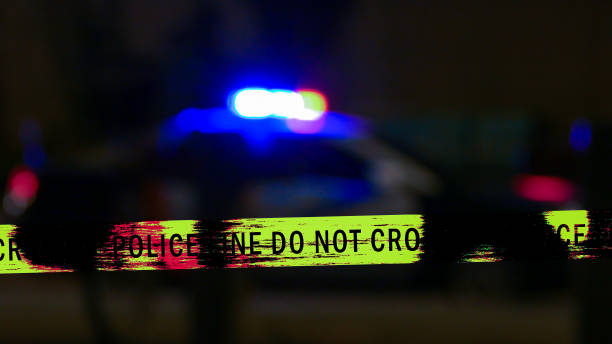 istock Police car siren with boundary tape, Defocused 679727044