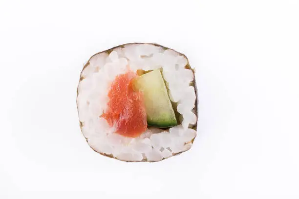 Traditional fresh Japanese sushi rolls on a white background. Roll with cucumber and smokedsalmon. isolated.