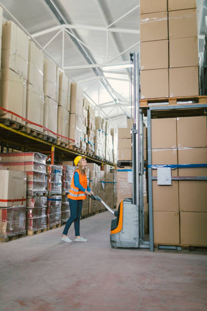 istock Female manual worker in warehouse 679727926