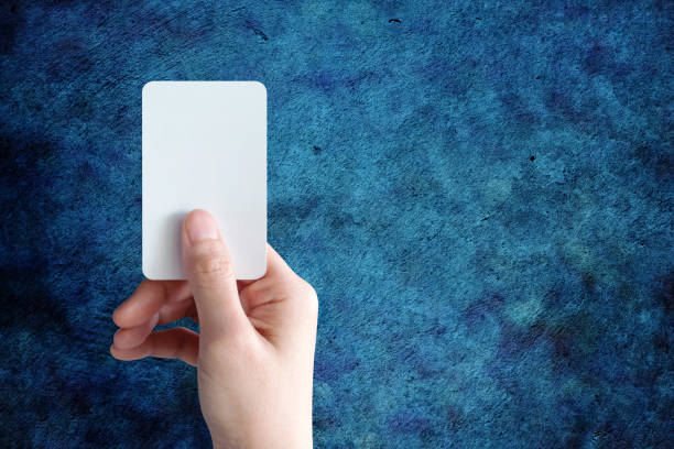 istock Woman hand holding blank business card 679728484