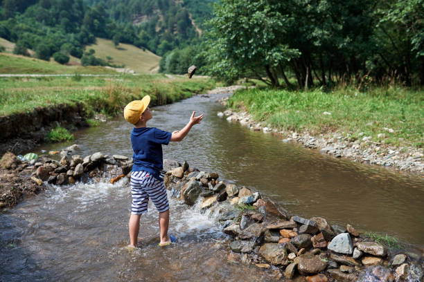 istock playful kid outdoors 679728624