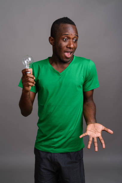 istock Studio shot of young African man against gray background 679755330