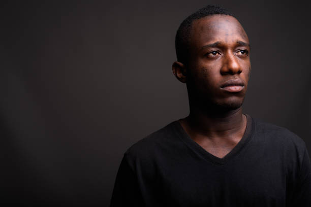 istock Studio shot of young African man against gray background 679758266