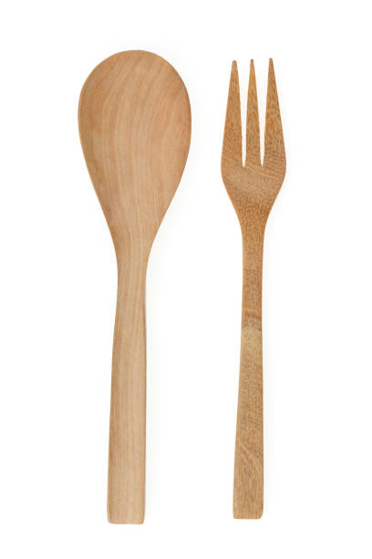 istock Wooden spoon and fork isolated on white background. 679760538